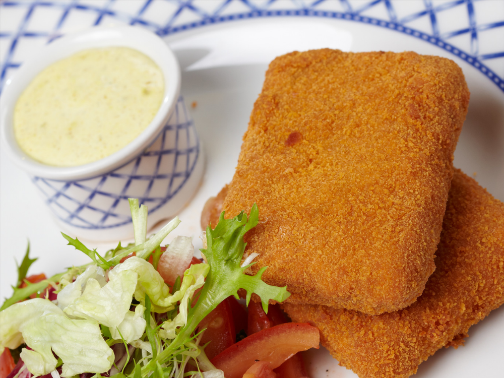 fish cutlet served with salad
